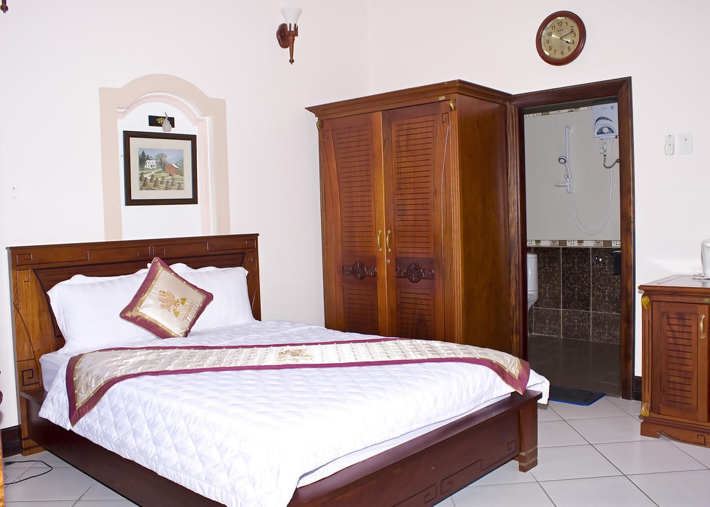 Gold Rooster Resort Phan Rang Quarto foto