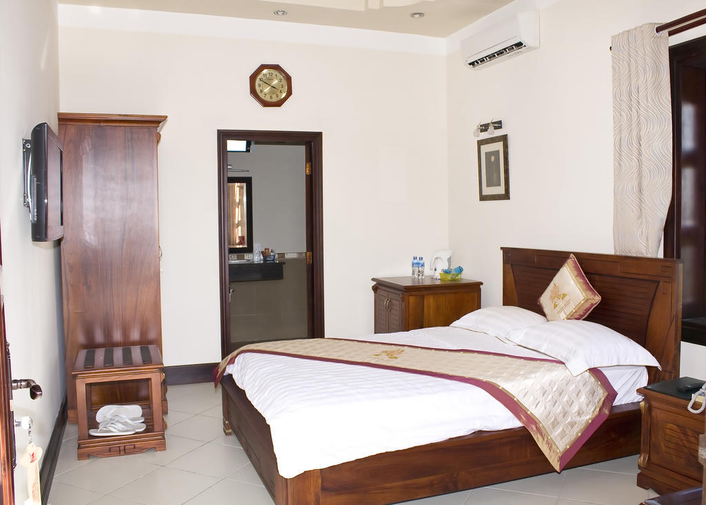 Gold Rooster Resort Phan Rang Quarto foto
